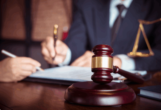 Image of an attorney at a desk
